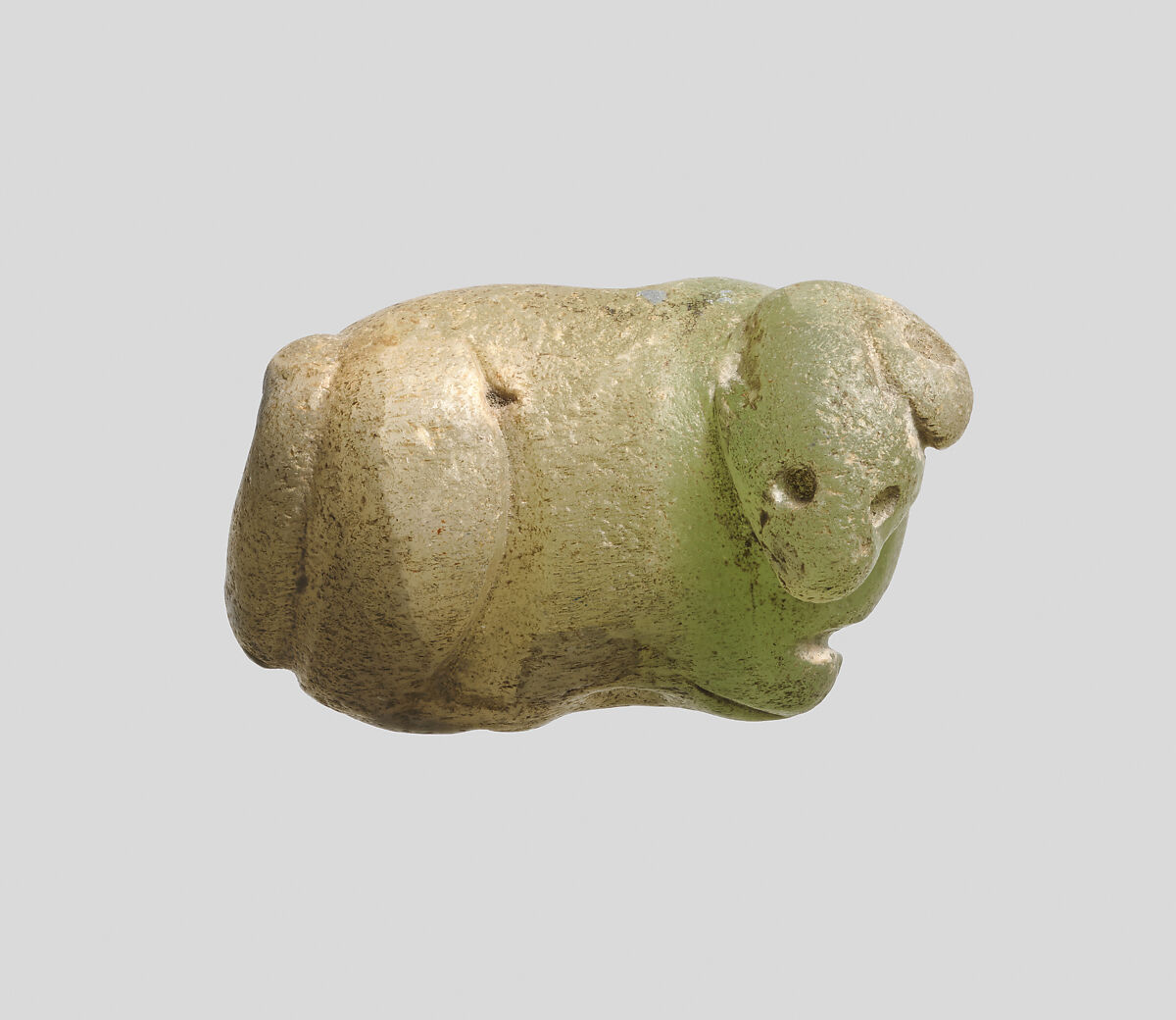 Seal amulet in the form of a recumbent bovid, Onyx marble, green-gray 