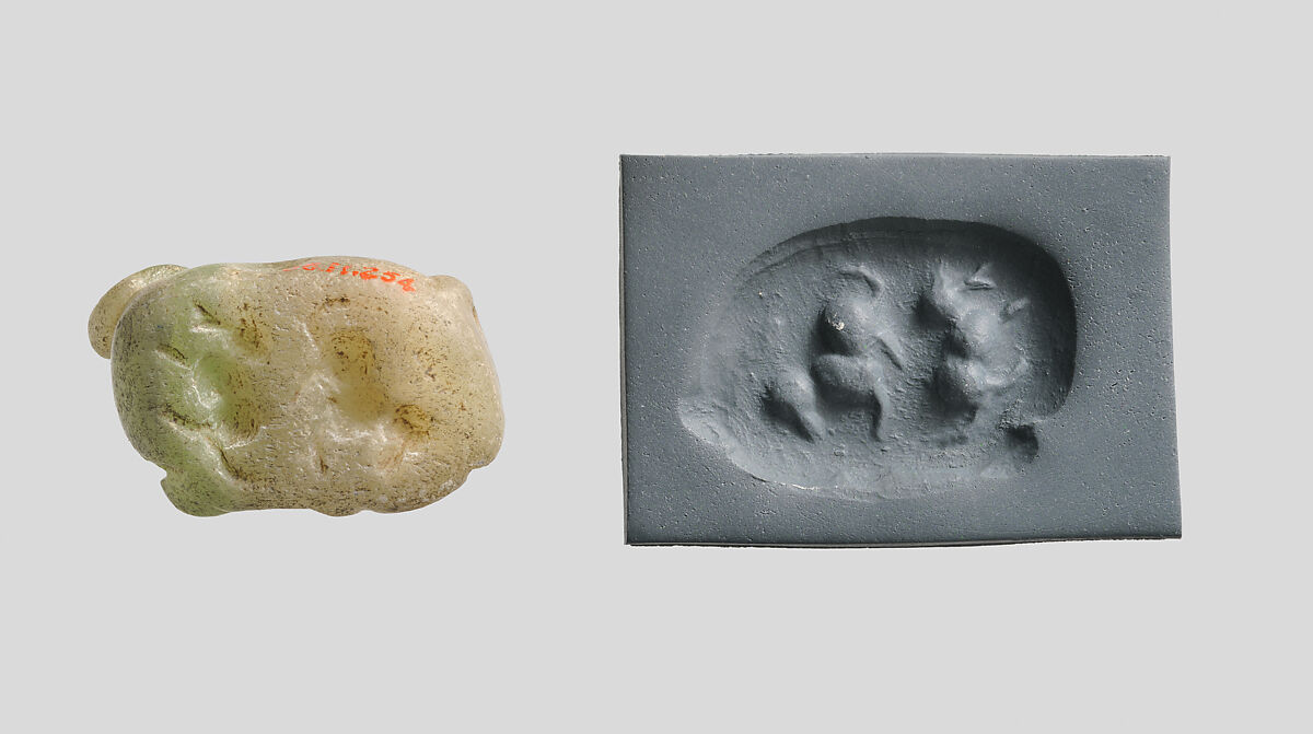 Seal amulet in the form of a recumbent bovid, Onyx marble, green-gray