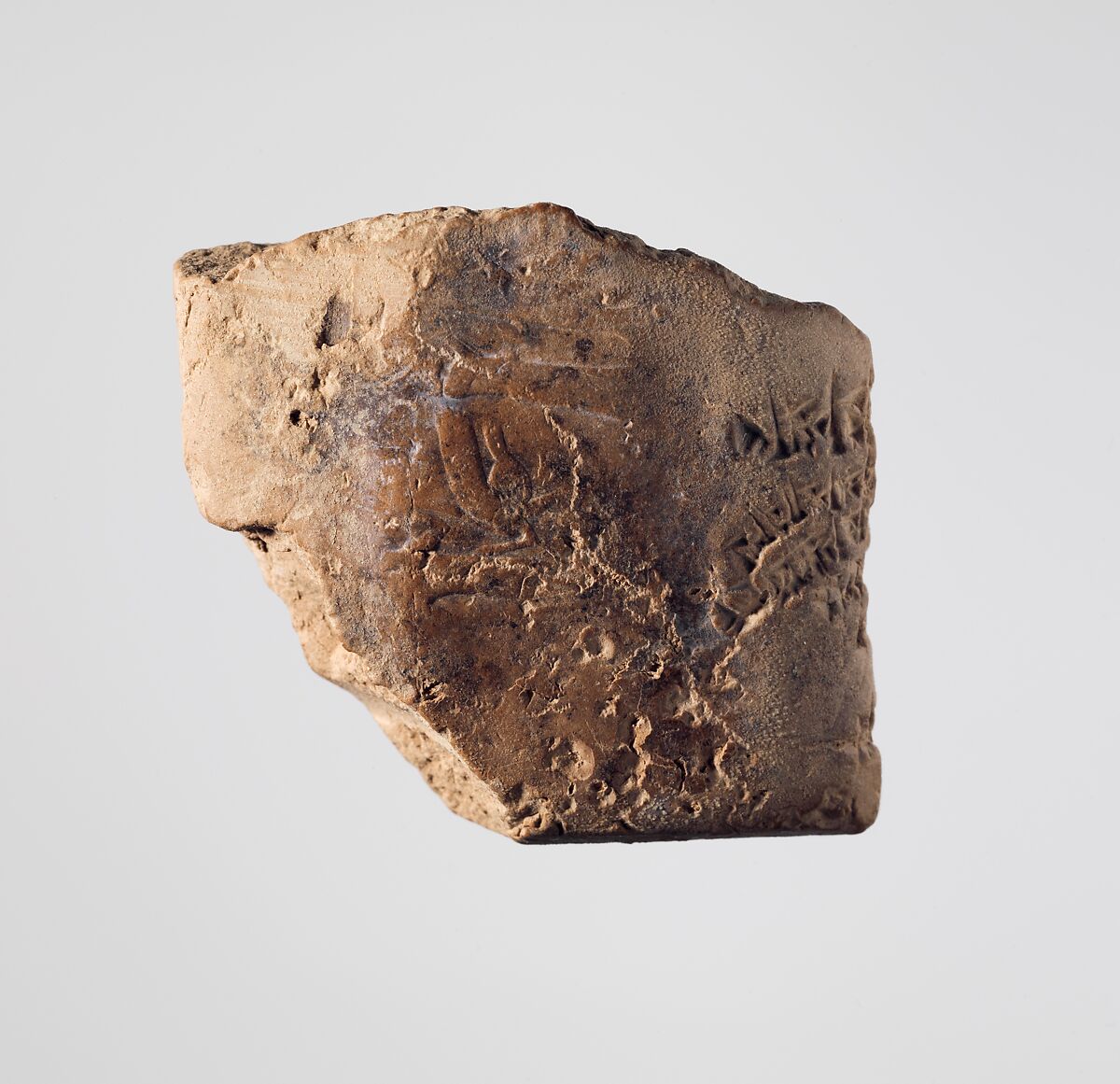 Cuneiform tablet impressed with seal: account of payments to hired workers, Clay, Babylonian or Achaemenid