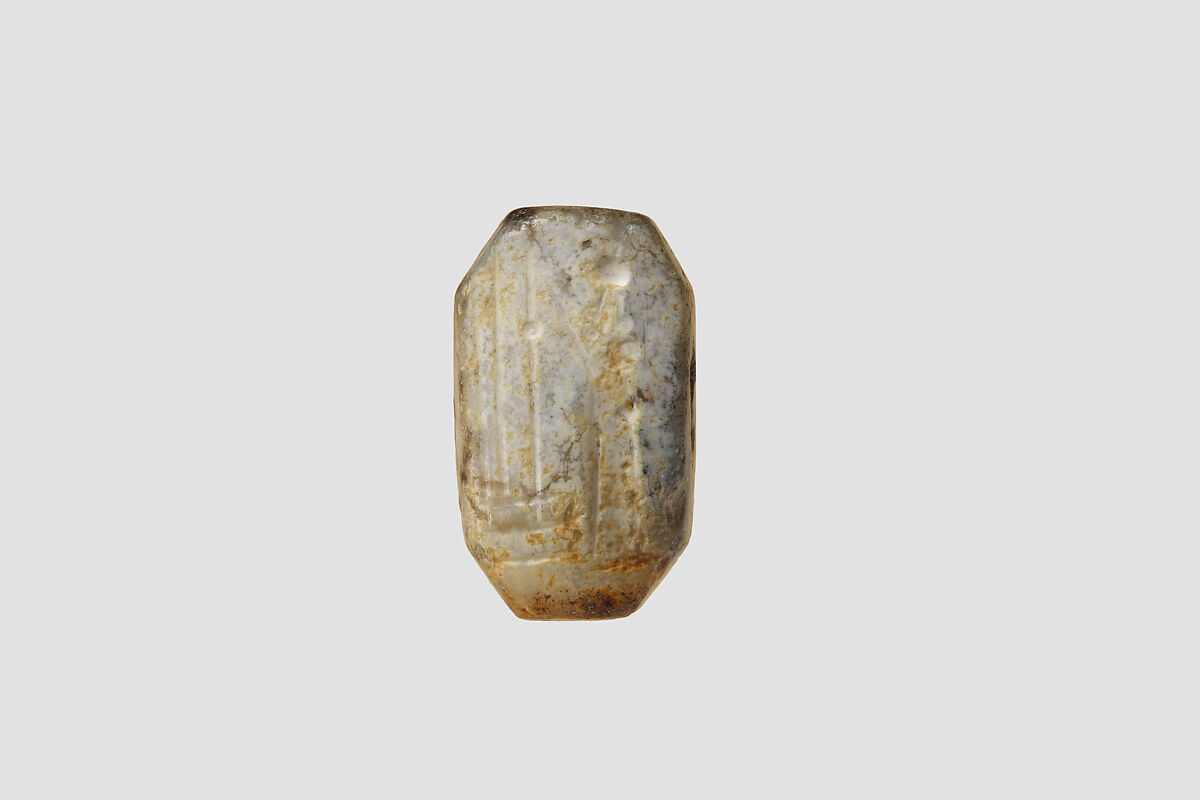 Stamp seal (octagonal pyramid) with cultic scene, Flawed and veined neutral Chalcedony (Quartz), possibly etched to produce mottling, Assyro-Babylonian