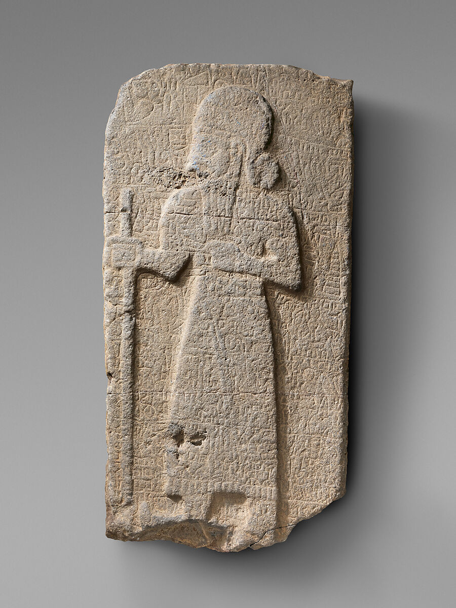 Relief: bearded figure holding staff; hieroglyphic inscription, Basalt, Hittite 