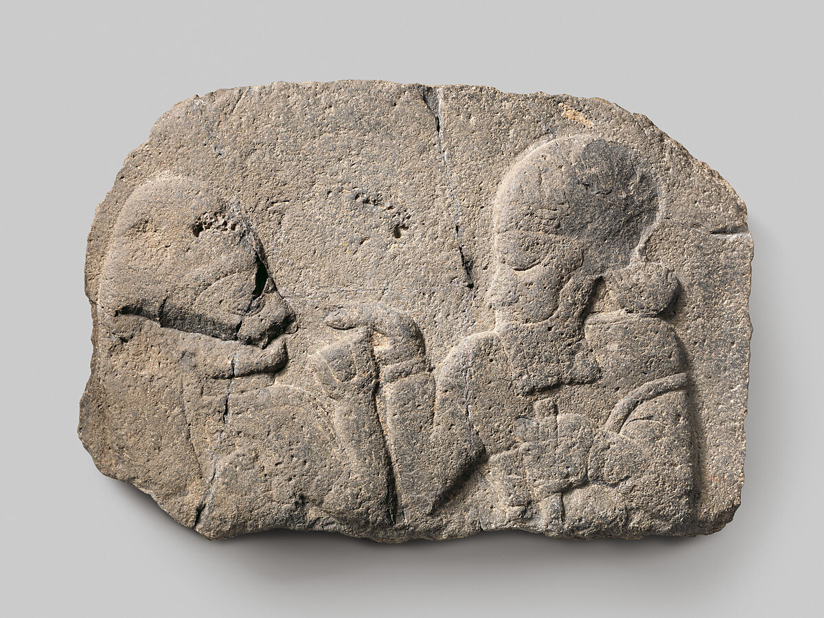 Neo-Hittitisk relief af en mand der holder et drikkekar for en kvinde