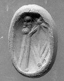 Stamp seal (octagonal pyramid) with cultic scene, Veined and flawed neutral Chalcedony (Quartz), Assyro-Babylonian 