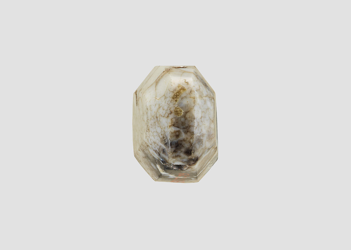 Stamp seal (octagonal pyramid) with cultic scene, Veined and flawed white and black Chalcedony (Quartz), possibly enhanced through heating, Assyro-Babylonian
