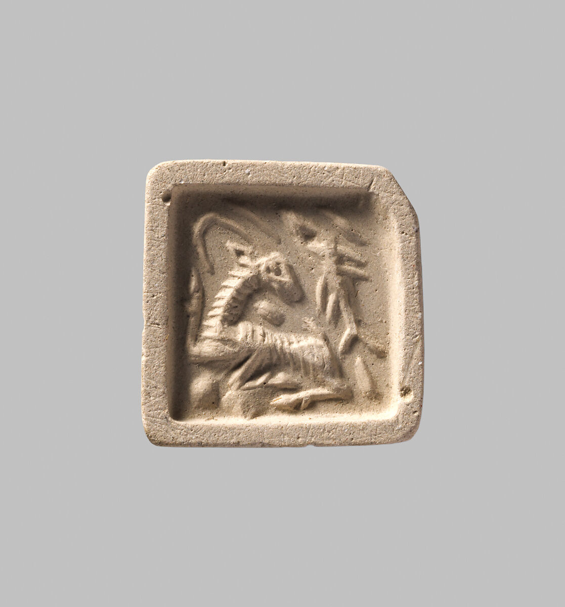 Square plaque seal with stalk handle, Hematite, black, Old Assyrian Trading Colony