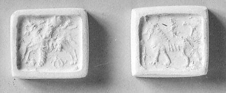 Stamp seal (cubical) with animals, monsters, and divine symbols, Serpentine, black, Assyrian 