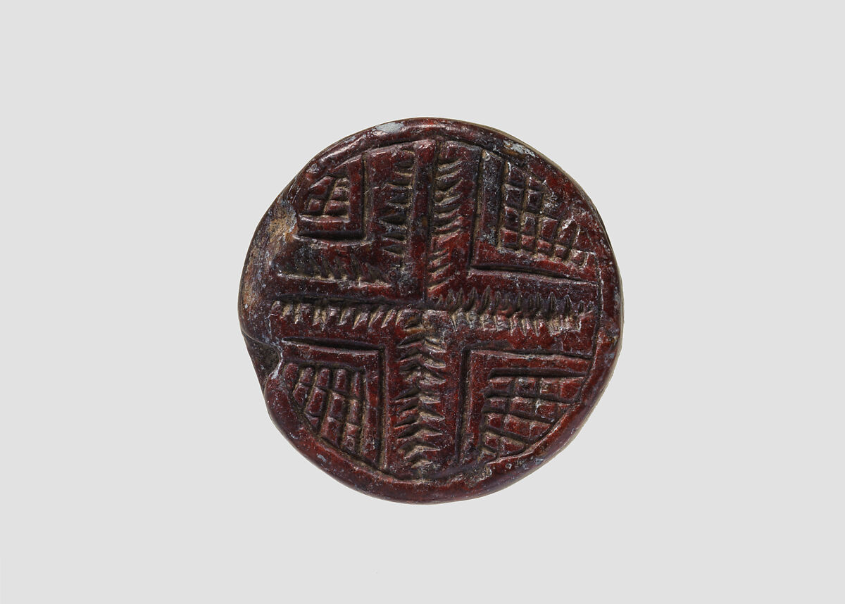 Discoid seal engraved on both faces, Red steatite, Hittite