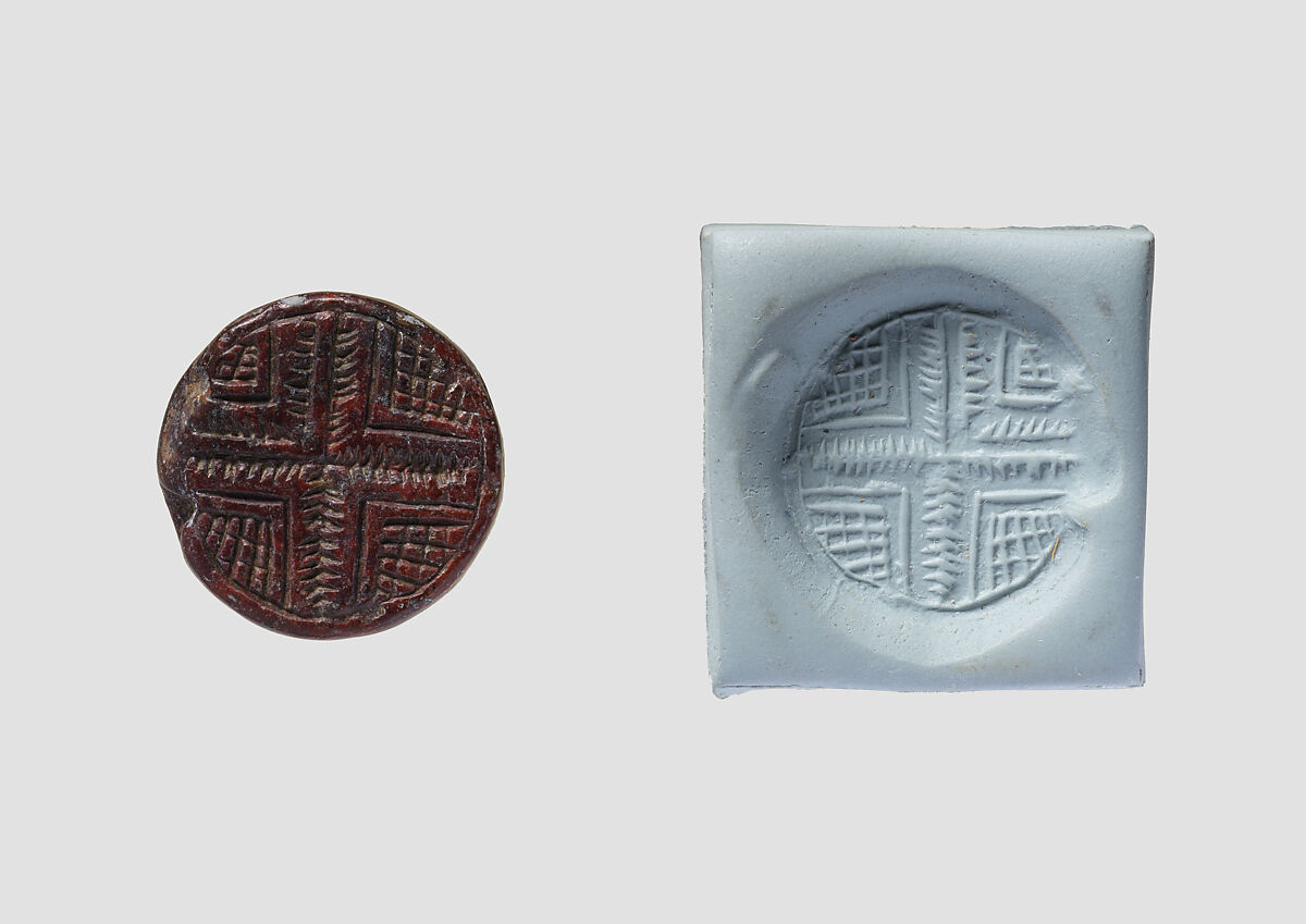 Discoid seal engraved on both faces, Red steatite, Hittite
