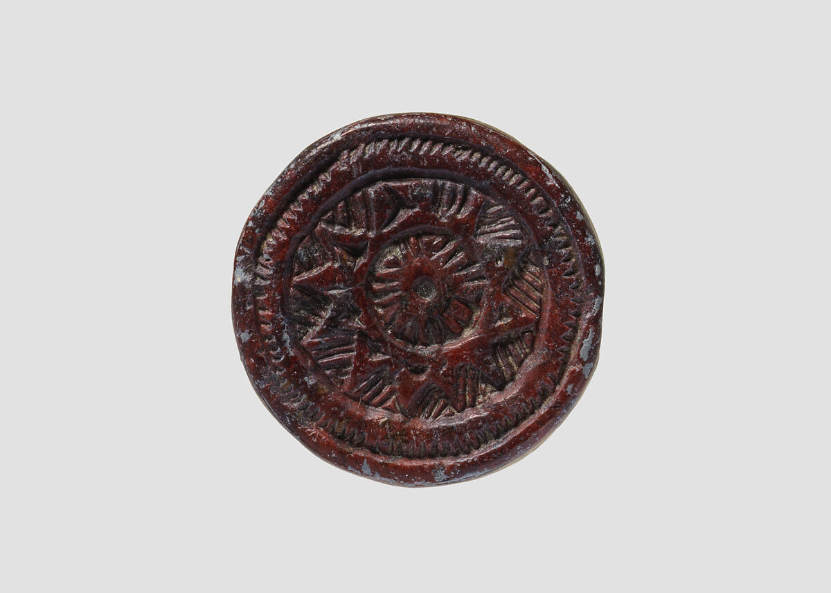 Discoid seal engraved on both faces, Red steatite, Hittite