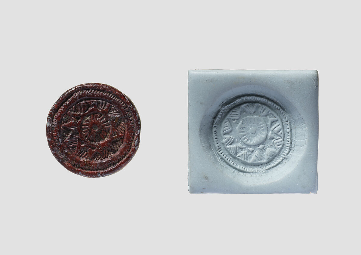 Discoid seal engraved on both faces, Red steatite, Hittite 