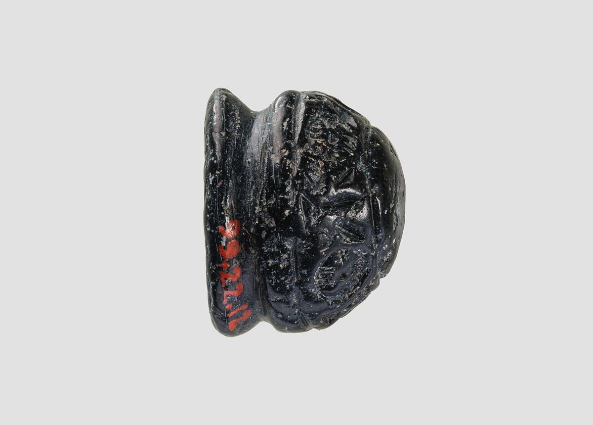 Cupola seal engraved on back and face, Black steatite, Hittite