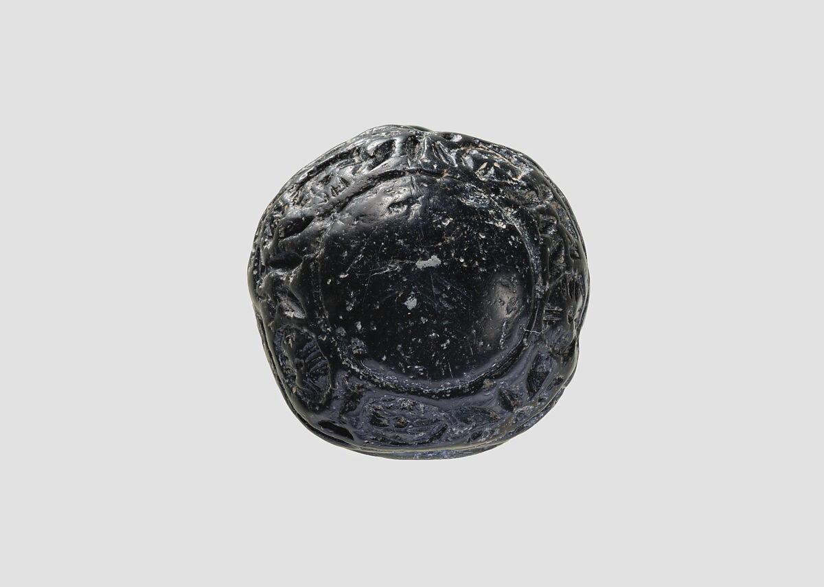 Cupola seal engraved on back and face, Black steatite, Hittite