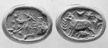 Stamp seal (bifacial disk) with animals and divine symbols, Steatite, brown, Assyrian 
