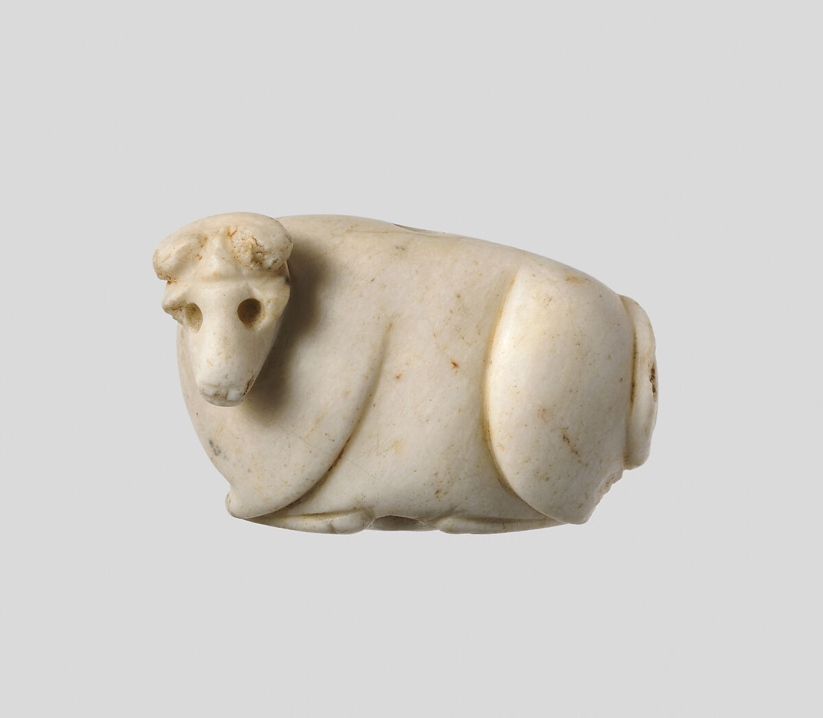 Seal amulet in the form of recumbent bovid, Marble 