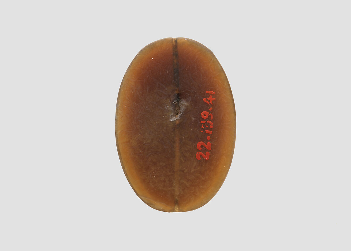 Stamp seal: standing noble holding a flower, Sardonyx, Sasanian