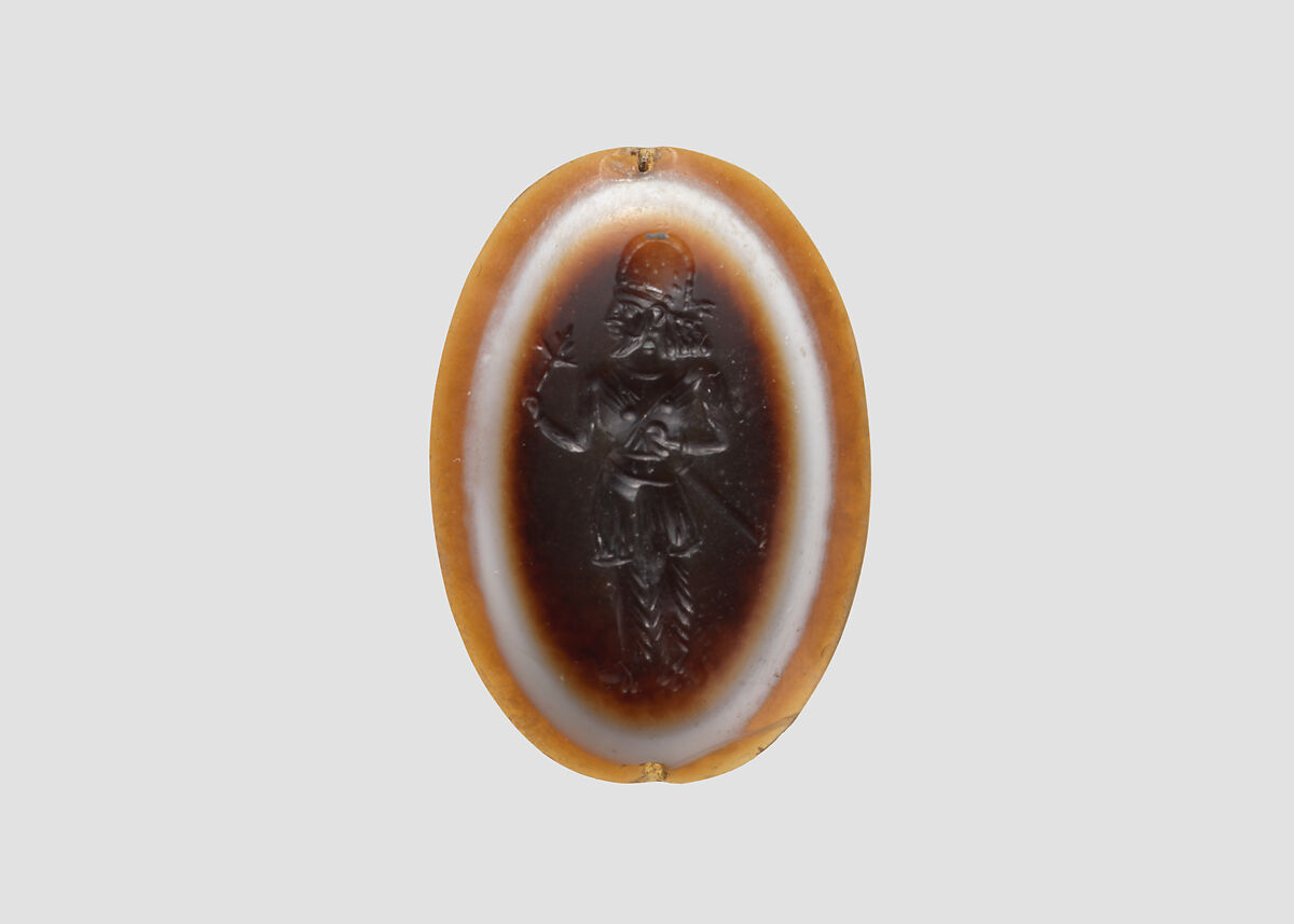 Stamp seal: standing noble holding a flower, Sardonyx, Sasanian