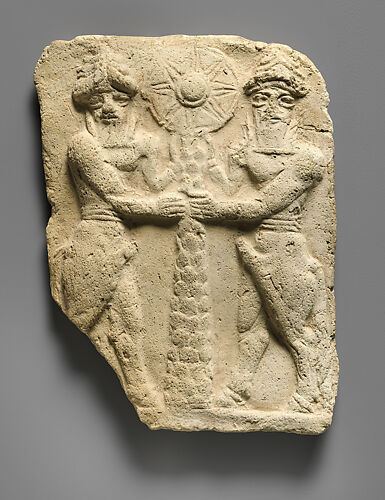 Molded plaque: bull-men flanking a tree trunk surmounted by a sun disc