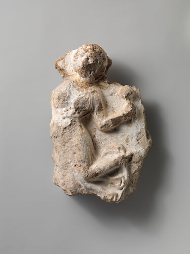 Fragment of a wall decoration with a female dancer