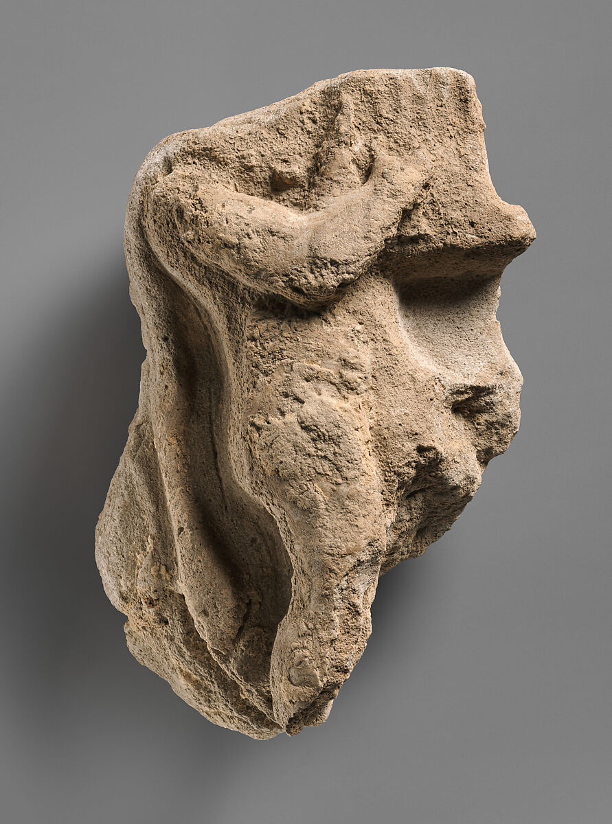 Fragment of a wall decoration with a figure playing a harp, Stucco, Sasanian 