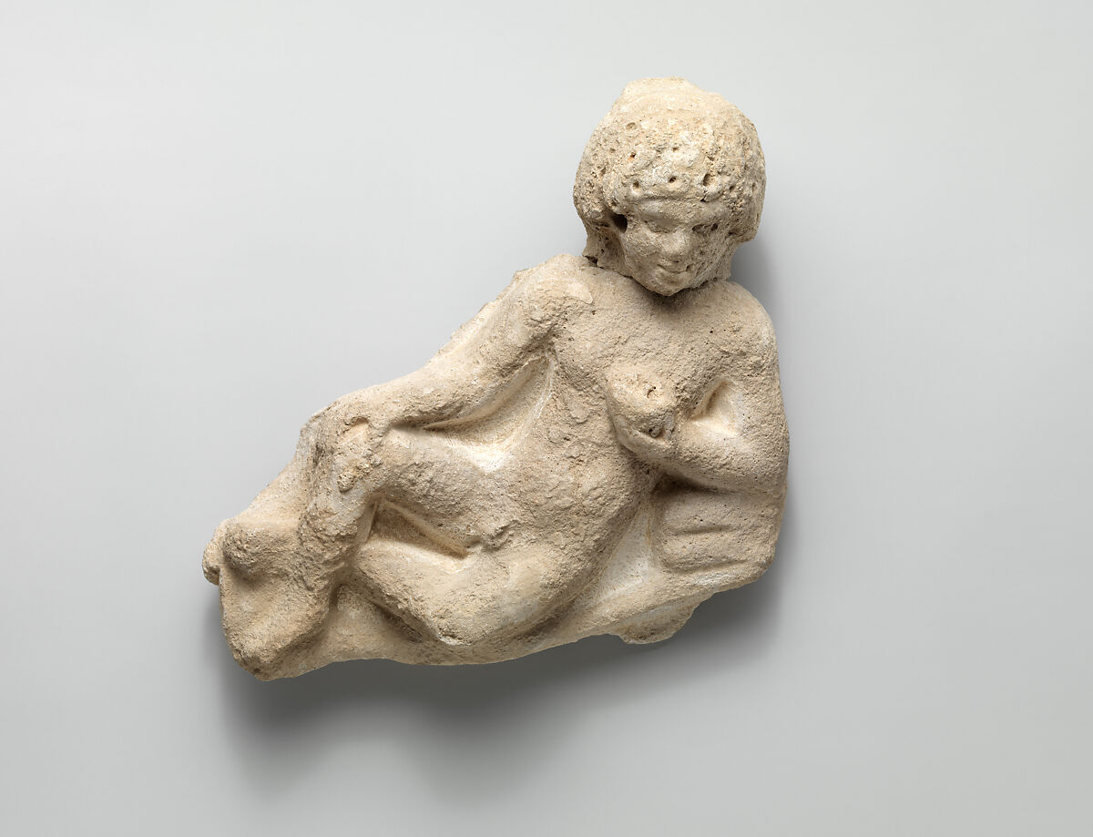 Fragment of a wall decoration with a reclining youth, Stucco, Sasanian 