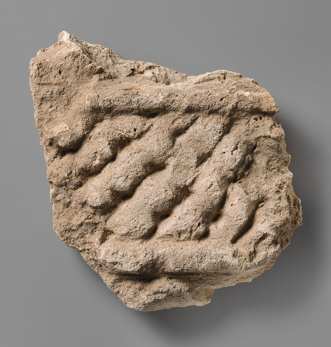 Relief fragment, Stucco, Sasanian or Islamic 