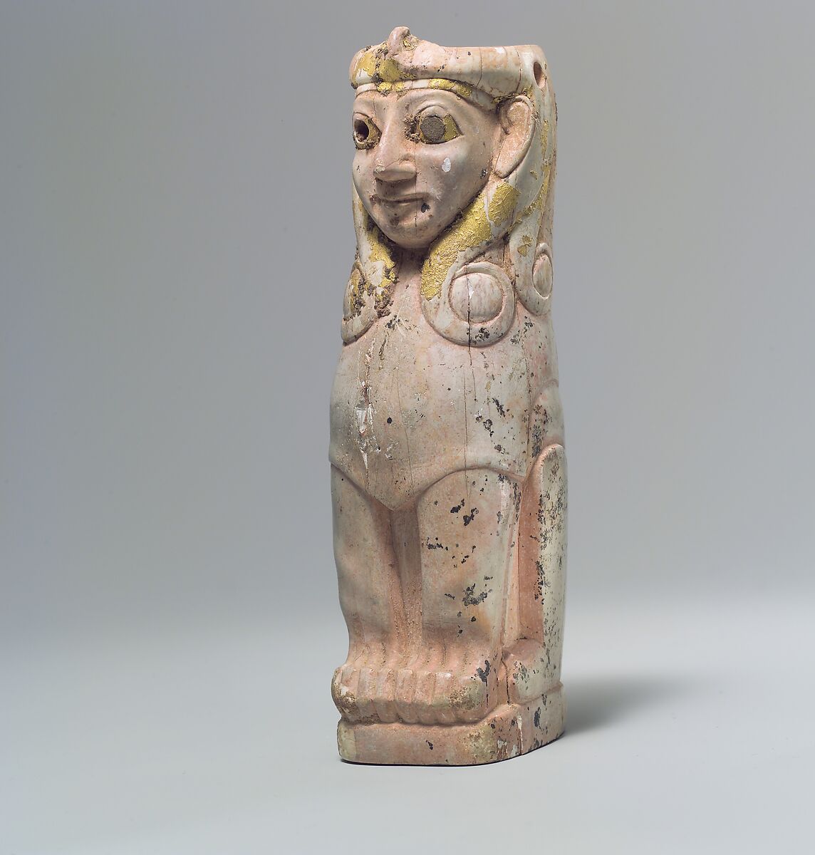 Furniture support: female sphinx with Hathor-style curls, Ivory (Hippopotamus), gold foil, Old Assyrian Trading Colony