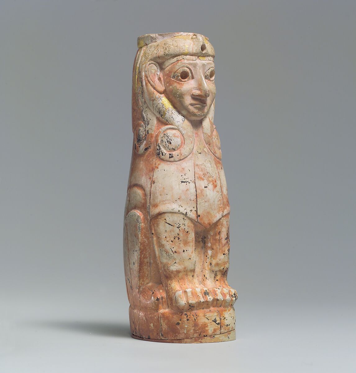 Furniture support: female sphinx with Hathor-style curls, Ivory (hippopotamus), gold foil, Old Assyrian Trading Colony