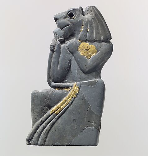 Plaque fragment: kneeling lion-headed figure