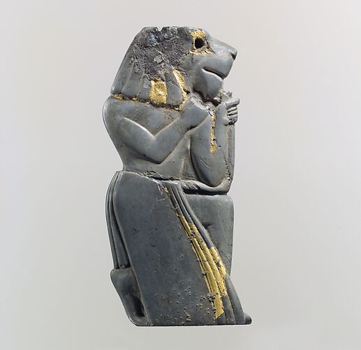Plaque fragment: kneeling lion-headed figure