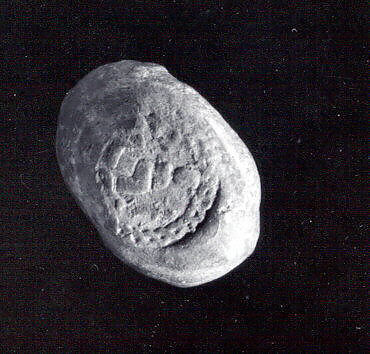 Oval sealing with one circular seal impression, Un-baked clay, Old Assyrian Trading Colony 
