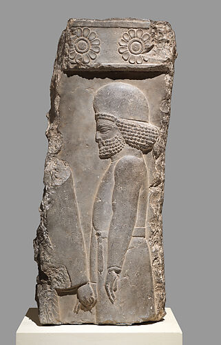 Relief: figure in a procession