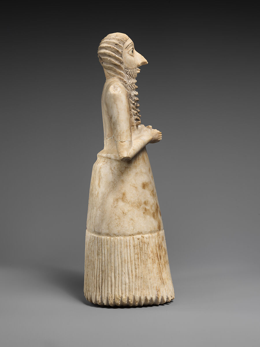 Standing male worshiper, Gypsum alabaster, shell, black limestone, bitumen, Sumerian