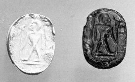 Stamp seal (scarab) with anthropomorphic figure, Mottled green glass, Phoenician 