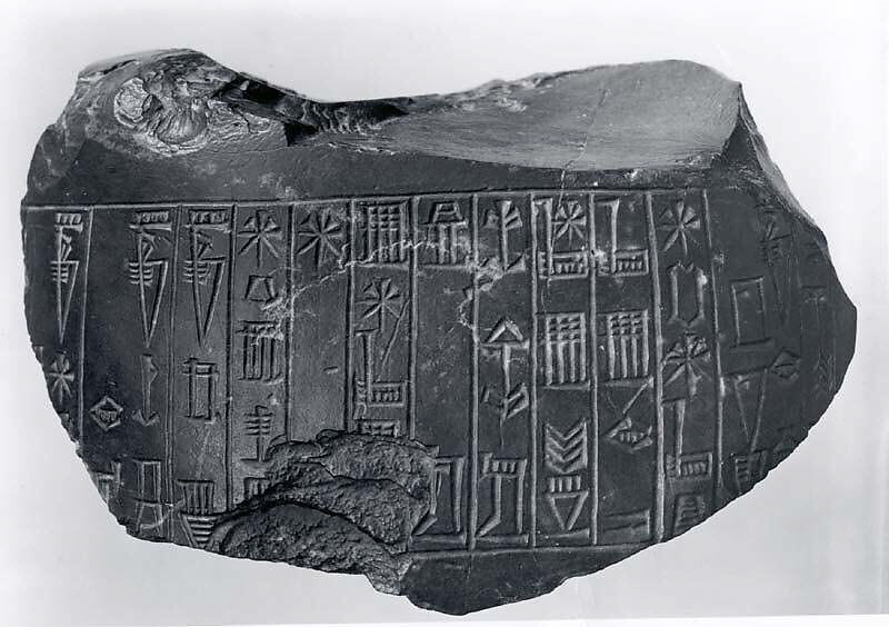 Statue fragment bearing incised cuneiform inscription of Amar-Sin, Marble, black, Neo-Sumerian 