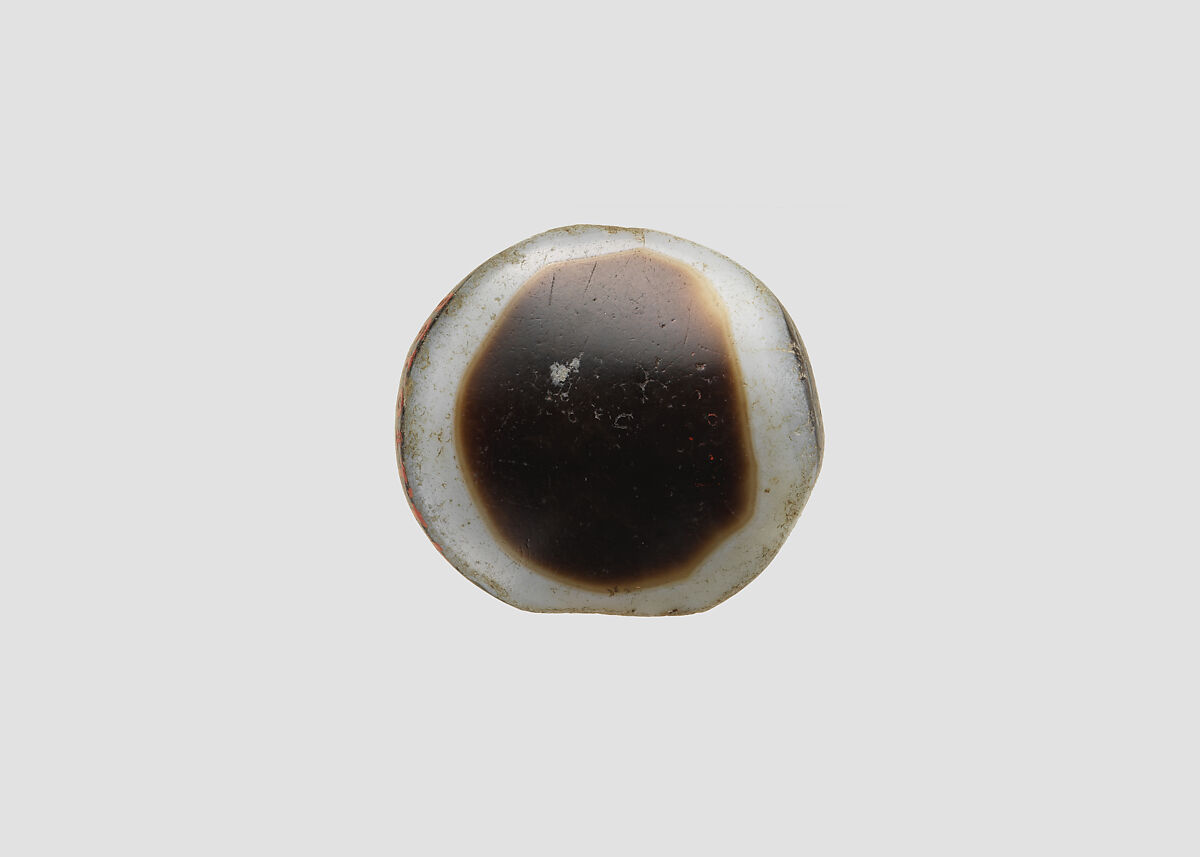 Stamp seal (scaraboid) with deity (?), Flawed brown and white eyestone Agate (Quartz), Achaemenid