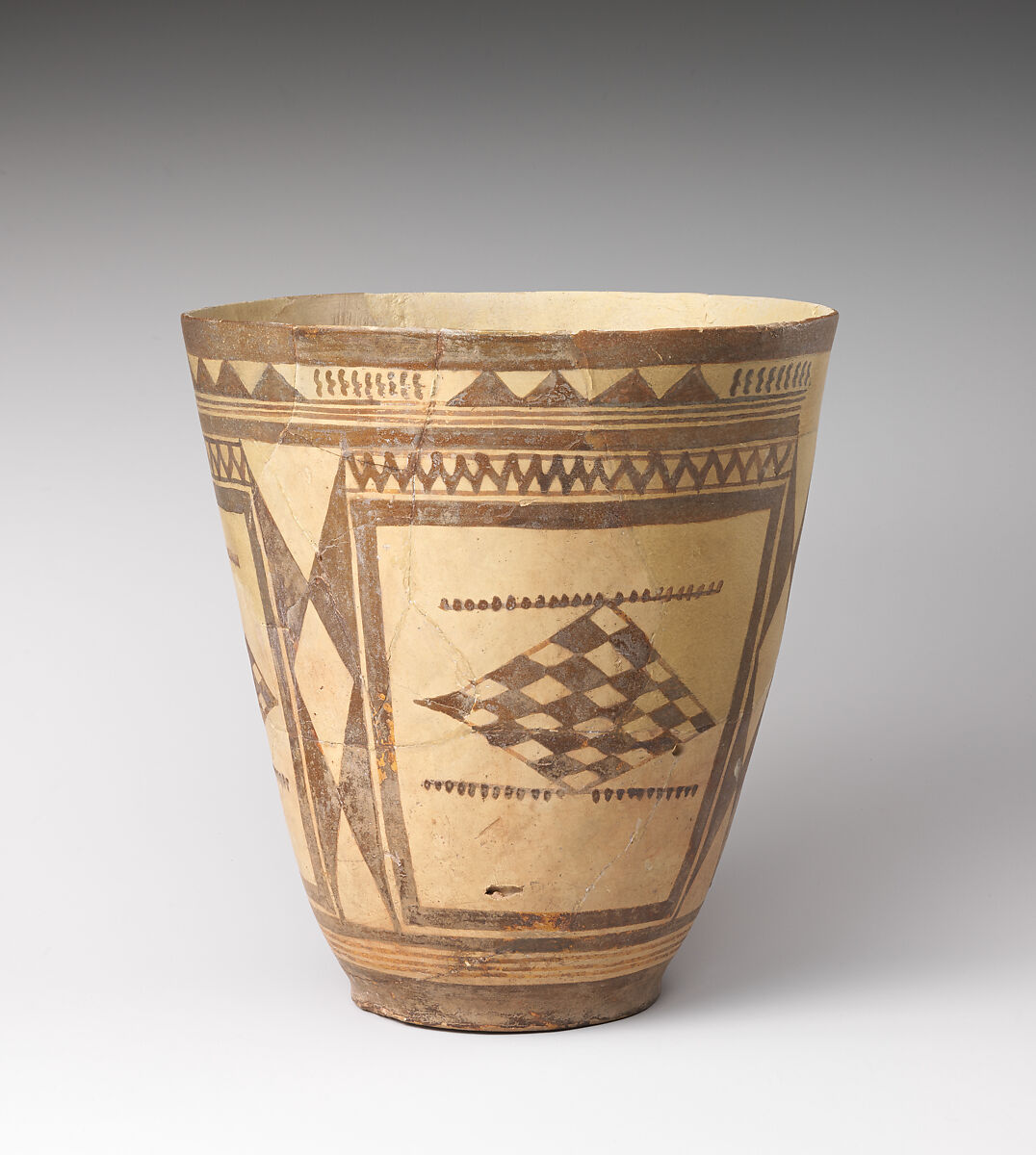 Beaker with a checkerboard design, Ceramic, Iran 