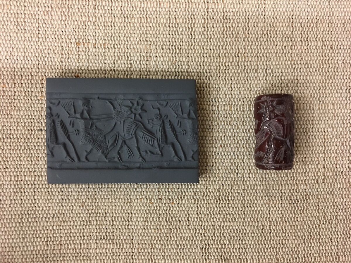 Cylinder seal with hunting scene, Mottled red Jasper (Quartz), Assyrian