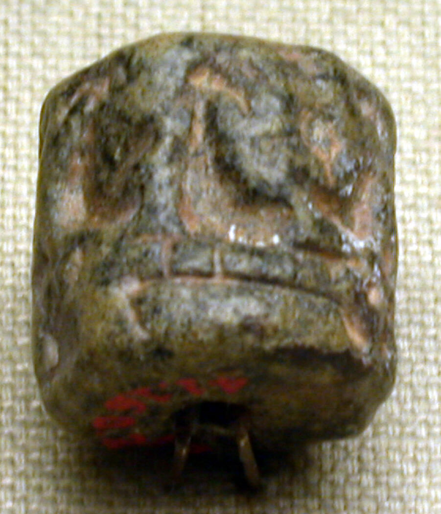 Cylinder seal and modern impression: female figure seated on a platform with "pigtailed ladies" and pots, Chlorite