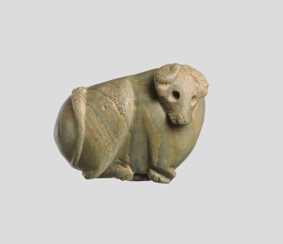 Seal amulet in the form of a reclining cow, Onyx 