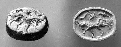 Stamp seal (scaraboid) with animal and divine symbols, Steatite, Assyrian 
