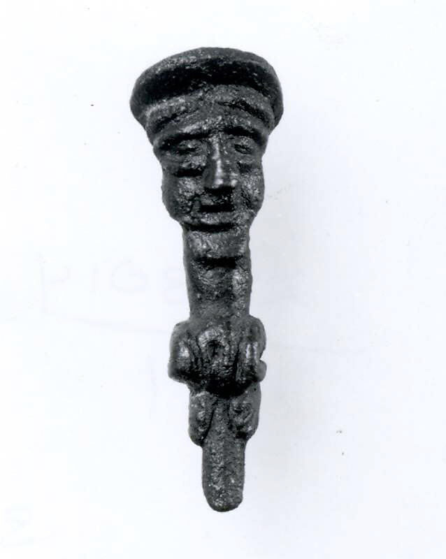 Head of a pin: seated figure with cap, Copper, Iran 