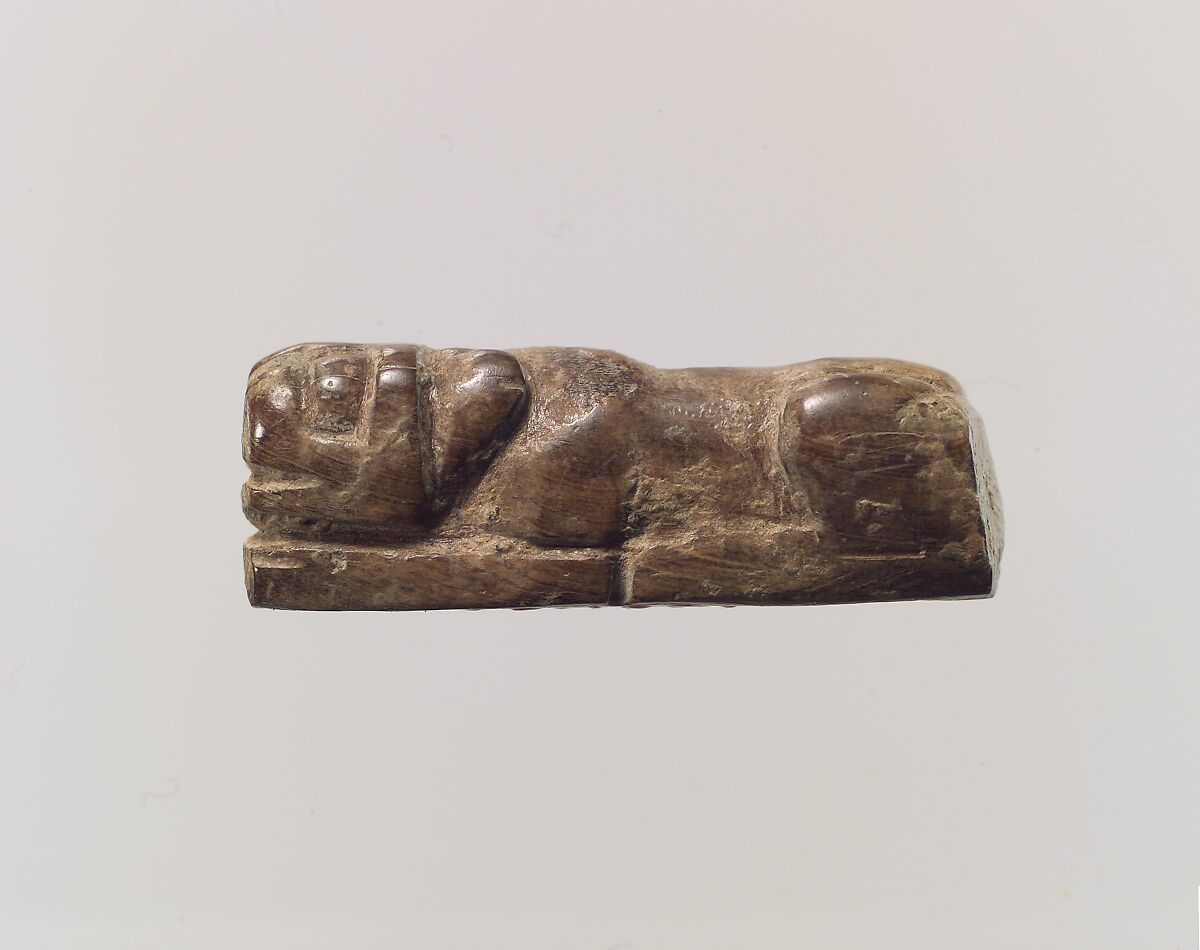 Figure of crouching lion, Ivory, Iran 