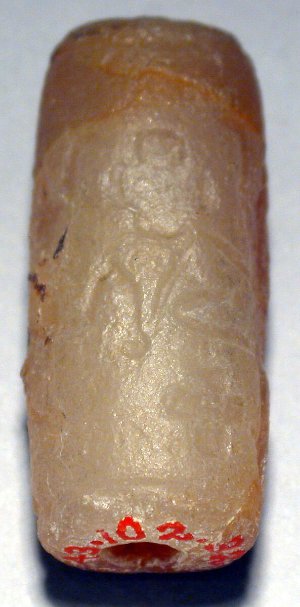 Cylinder sea and modern impression: three figures, Neutral Steatite, differentialy etched to produce coral veining, Elamite
