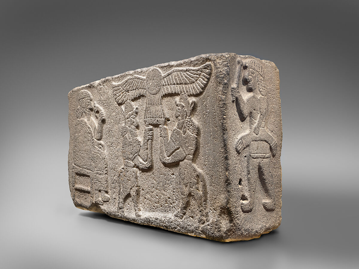 Orthostat relief: seated figure holding a lotus flower, Basalt, Hittite