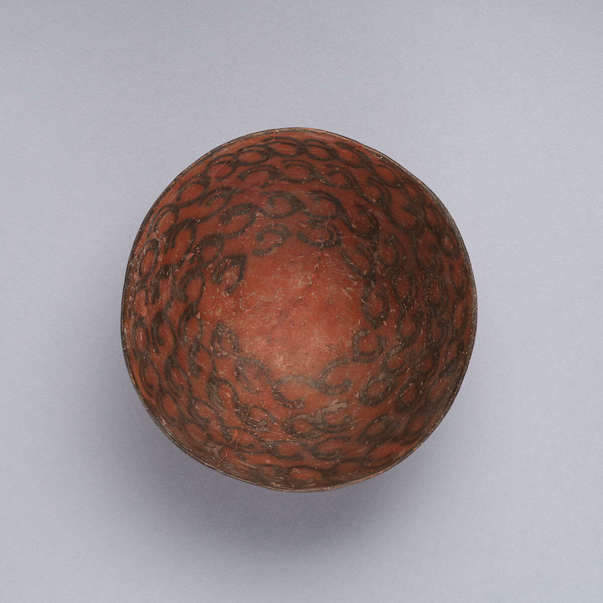 Bowl decorated with linked ibex horns, Ceramic, paint, Iran