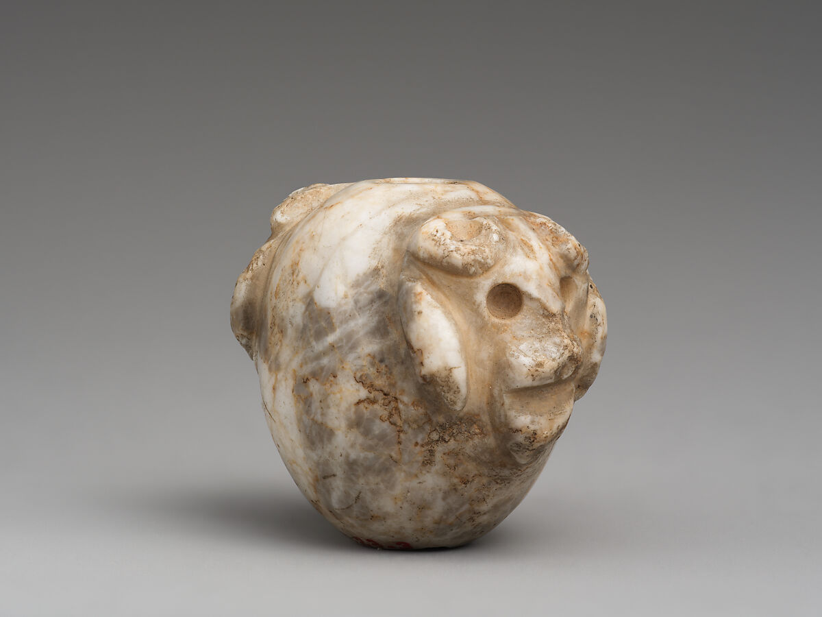Mace head with two bull's heads, Marble, Sumerian