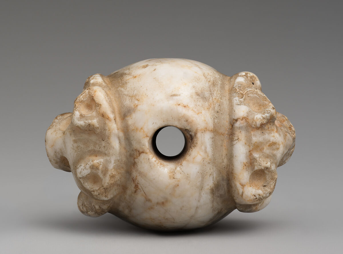Mace head with two bull's heads, Marble, Sumerian