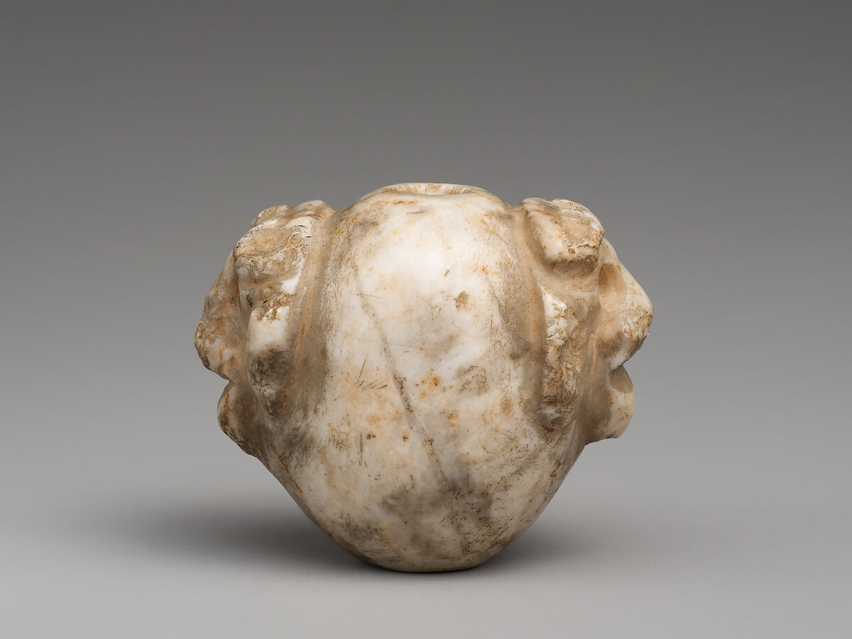 Mace head with two bull's heads, Marble, Sumerian