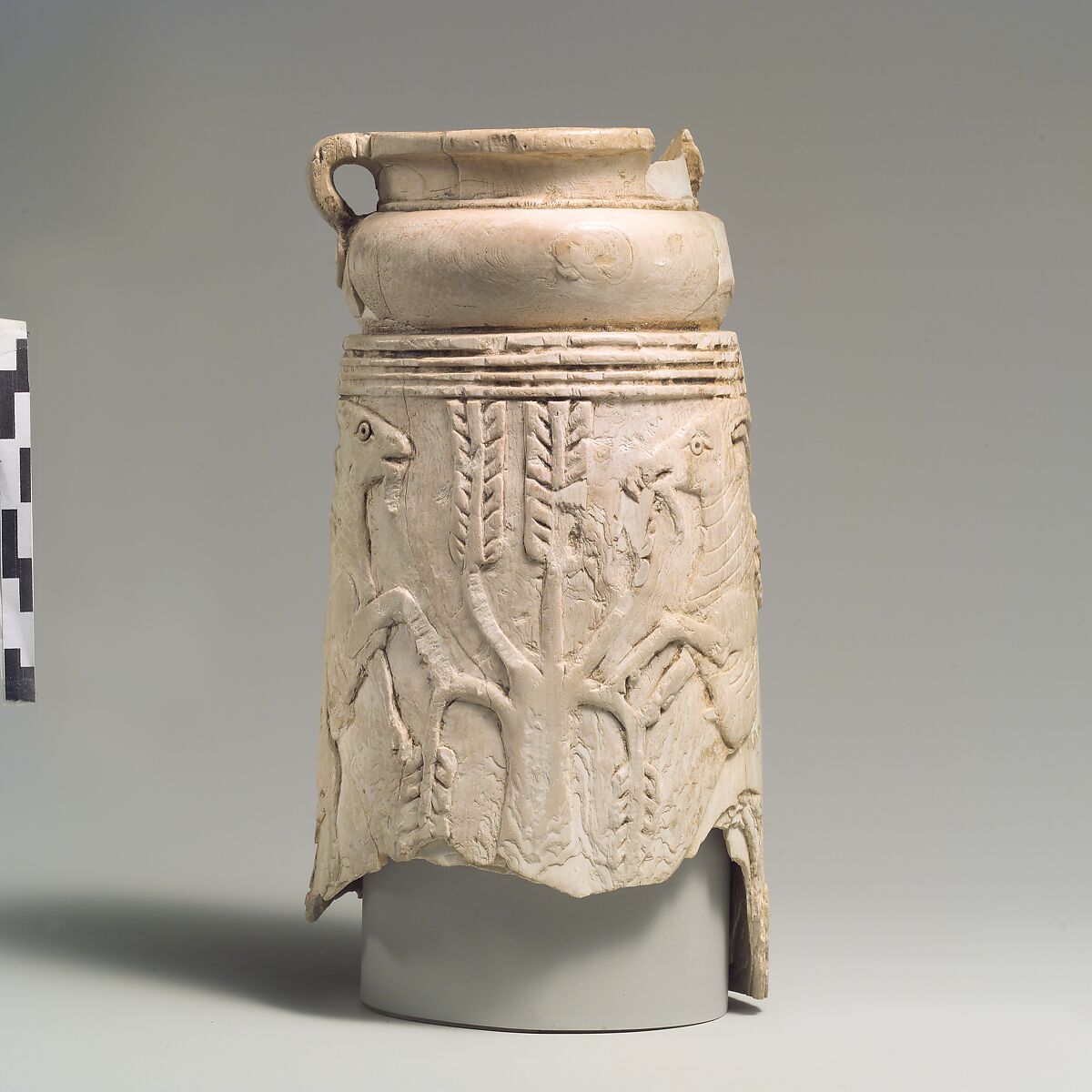 Levantine vessel with rampant goats and olive trees, Ivory