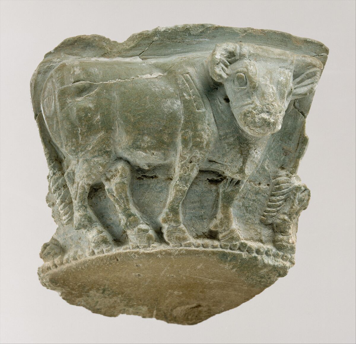 Fragment of a bowl with a frieze of bulls in relief, Steatite with chlorite 